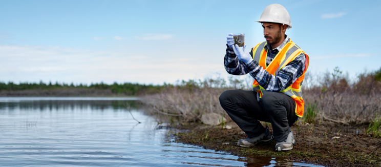 Image of man testing water