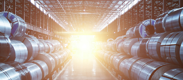 Image of light coming from back of a factory