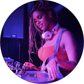 Image of a woman DJ'ing