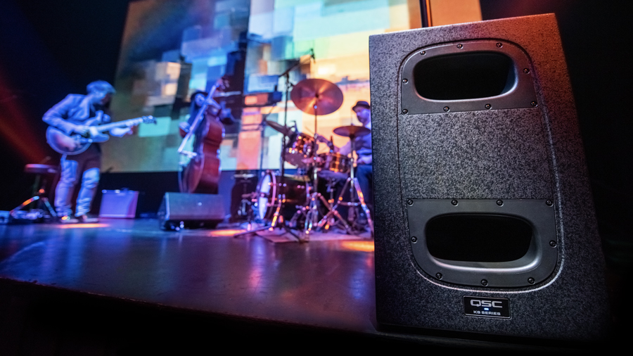 Image of a KS212C subwoofer on stage