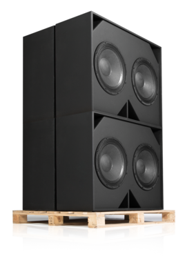 The QSC SB-2180 Compact Subwoofer sitting on top of a wooden pallet