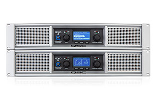 Two QSC GXD Series Amplifiers stacked on top of eachother